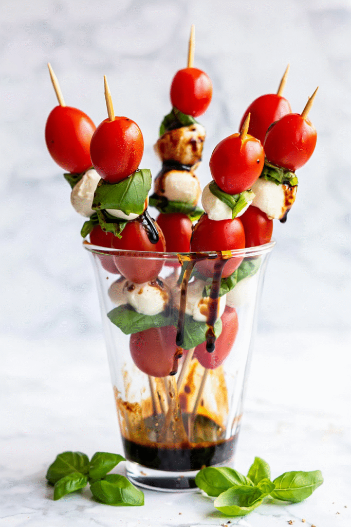 20 Christmas Appetizer Ideas to Elevate Your Holiday Spread 11 Caprese Salad Skewers with Balsamic Glaze