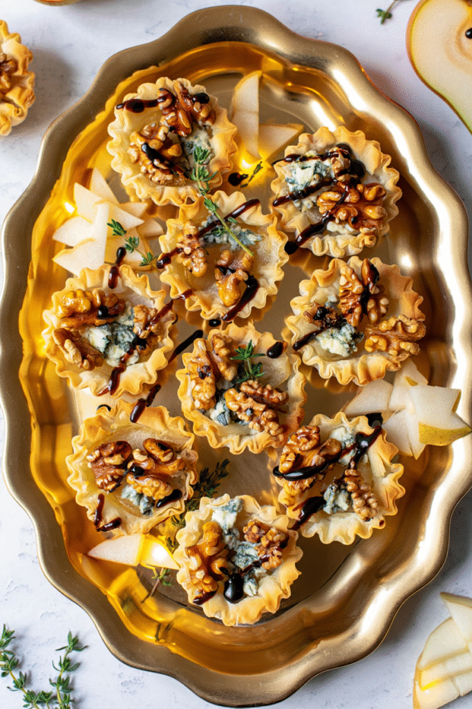 20 Christmas Appetizer Ideas to Elevate Your Holiday Spread 3 Pear and Blue Cheese Phyllo Tartlets