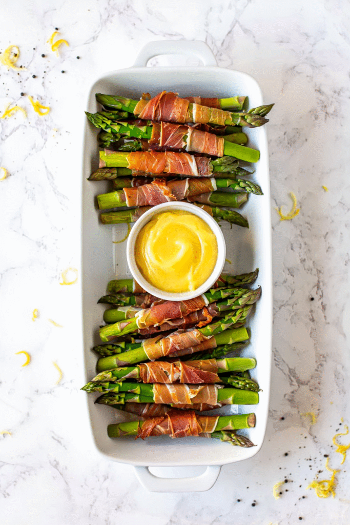 20 Christmas Party Appetizers That Will Steal the Show 5 Prosciutto Wrapped Asparagus with Lemon Aioli