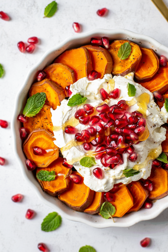 20 Christmas Appetizer Ideas to Elevate Your Holiday Spread 2 Sweet Potato Rounds with Whipped Feta and Pomegranate
