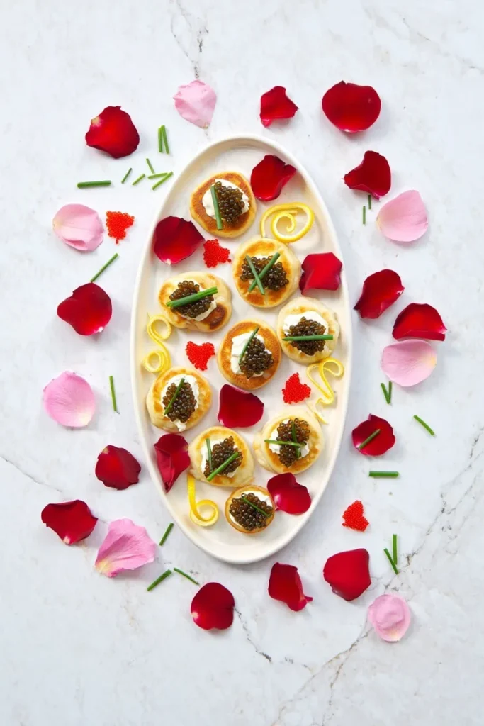 Osetra Caviar on Blinis with Crme Frache and Chives